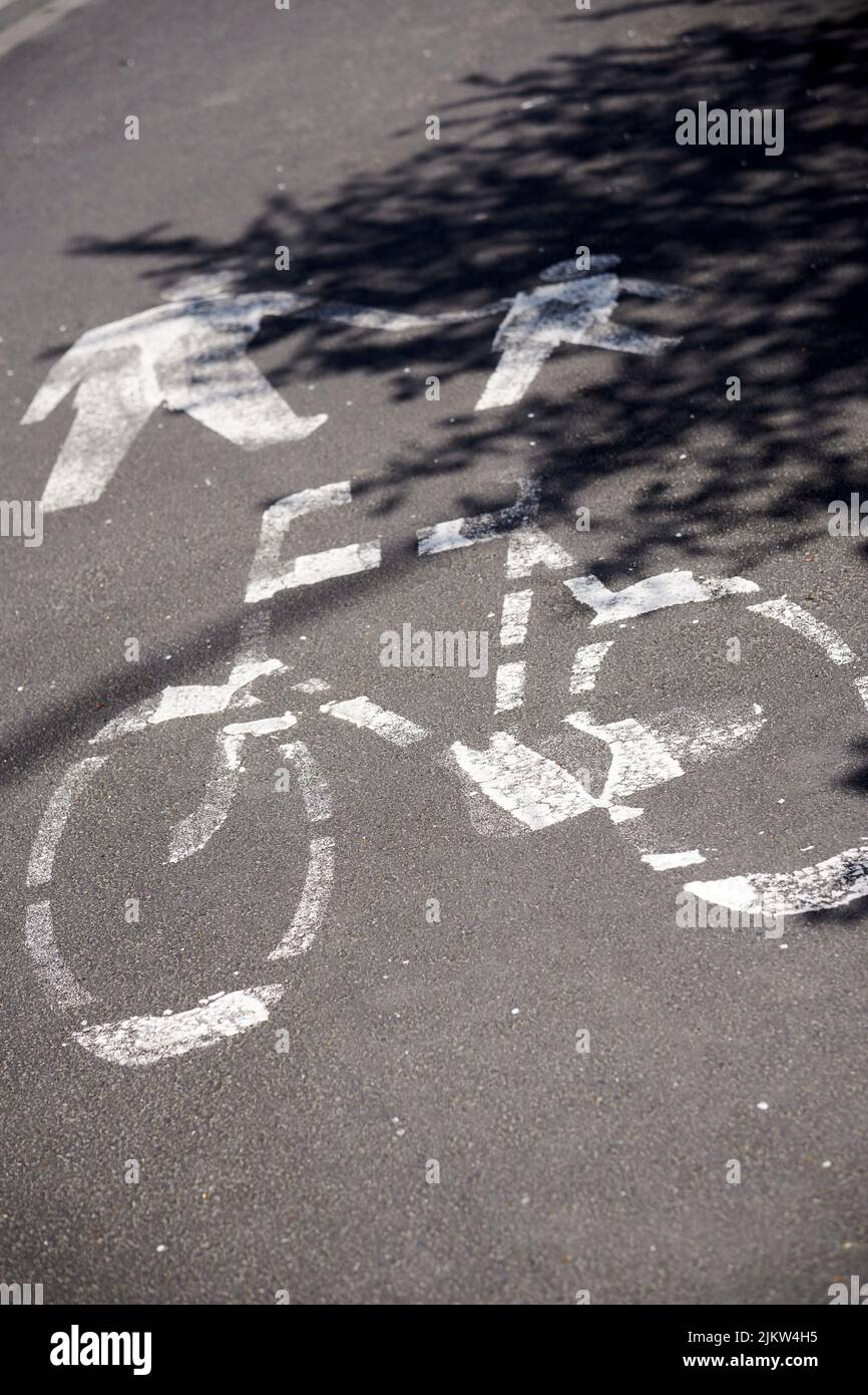 A bicycle way road sign and walking sign on asphalt Stock Photo - Alamy