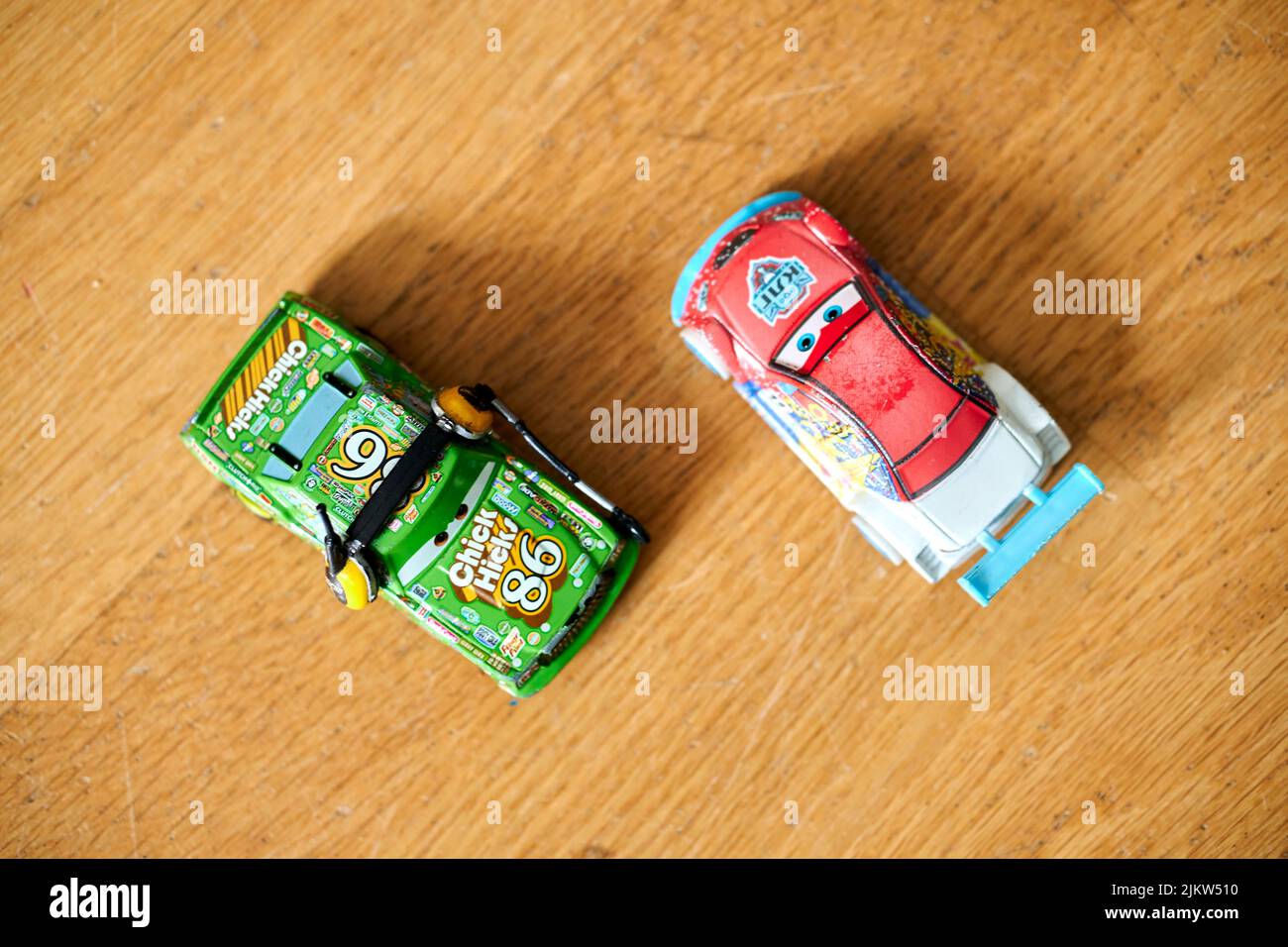 The Mattel Disney Pixar toy model cars from the Cars movie on a wooden surface Stock Photo