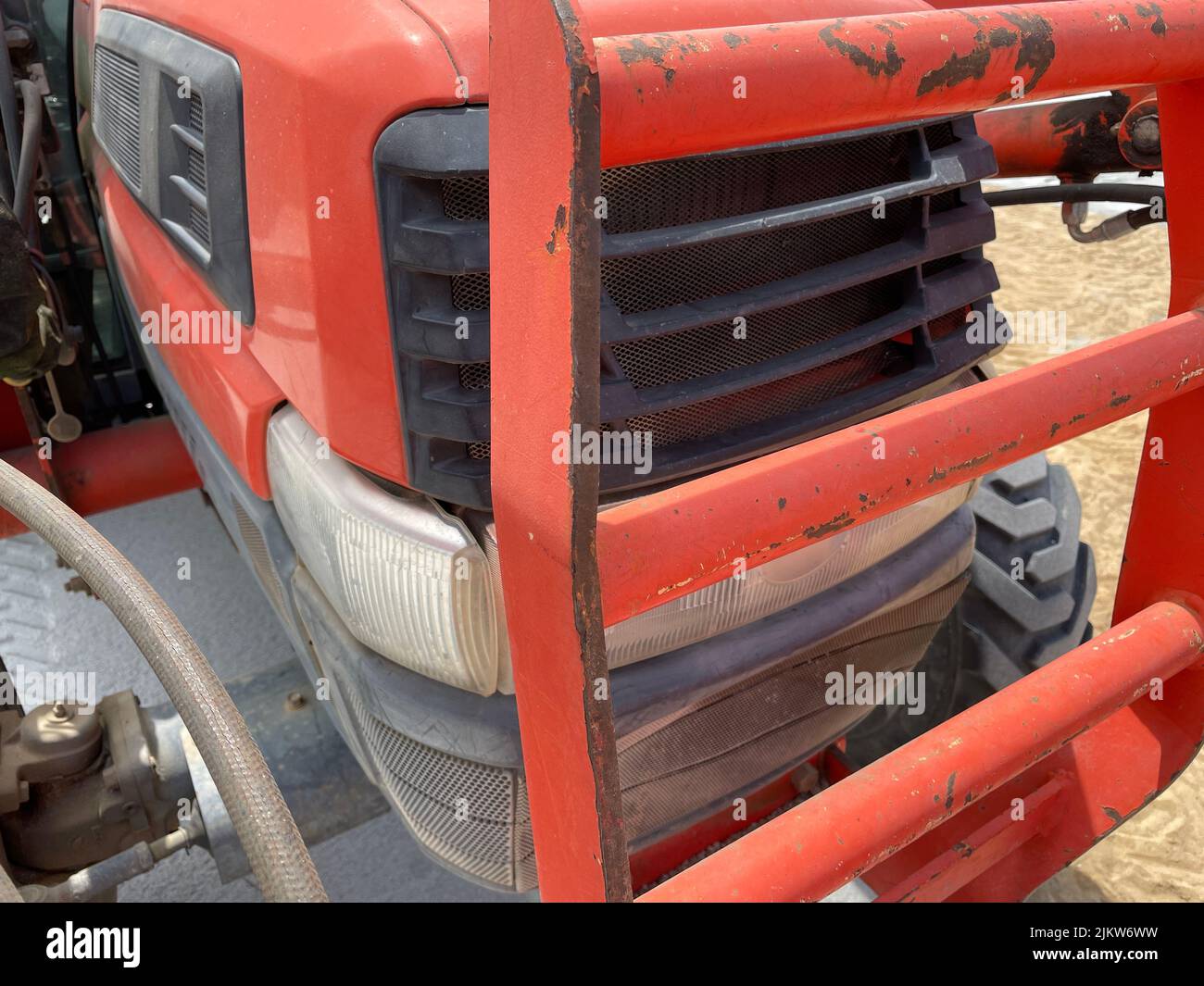 Augusta, Ga USA 04 13 22 Kubota red tractor front engine grill Stock