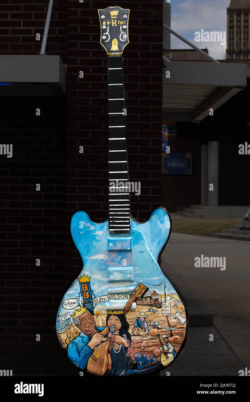 A vertical shot of a guitar with Ruby Wilson and B.B. King painting ...