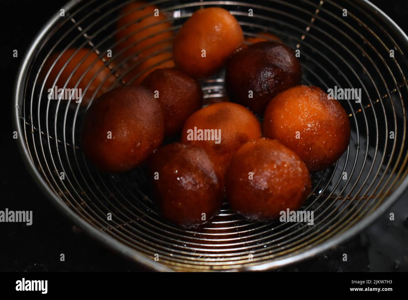 Indian sweet dish called ' gulab jamun '. Stock Photo