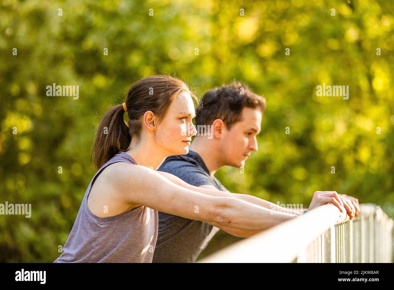 Man woman doing stretching exercises hi-res stock photography and ...