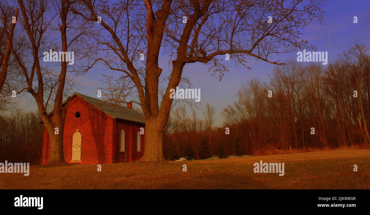 A farmhouse at dusk in Columbia city, Indiana, United States Stock Photo