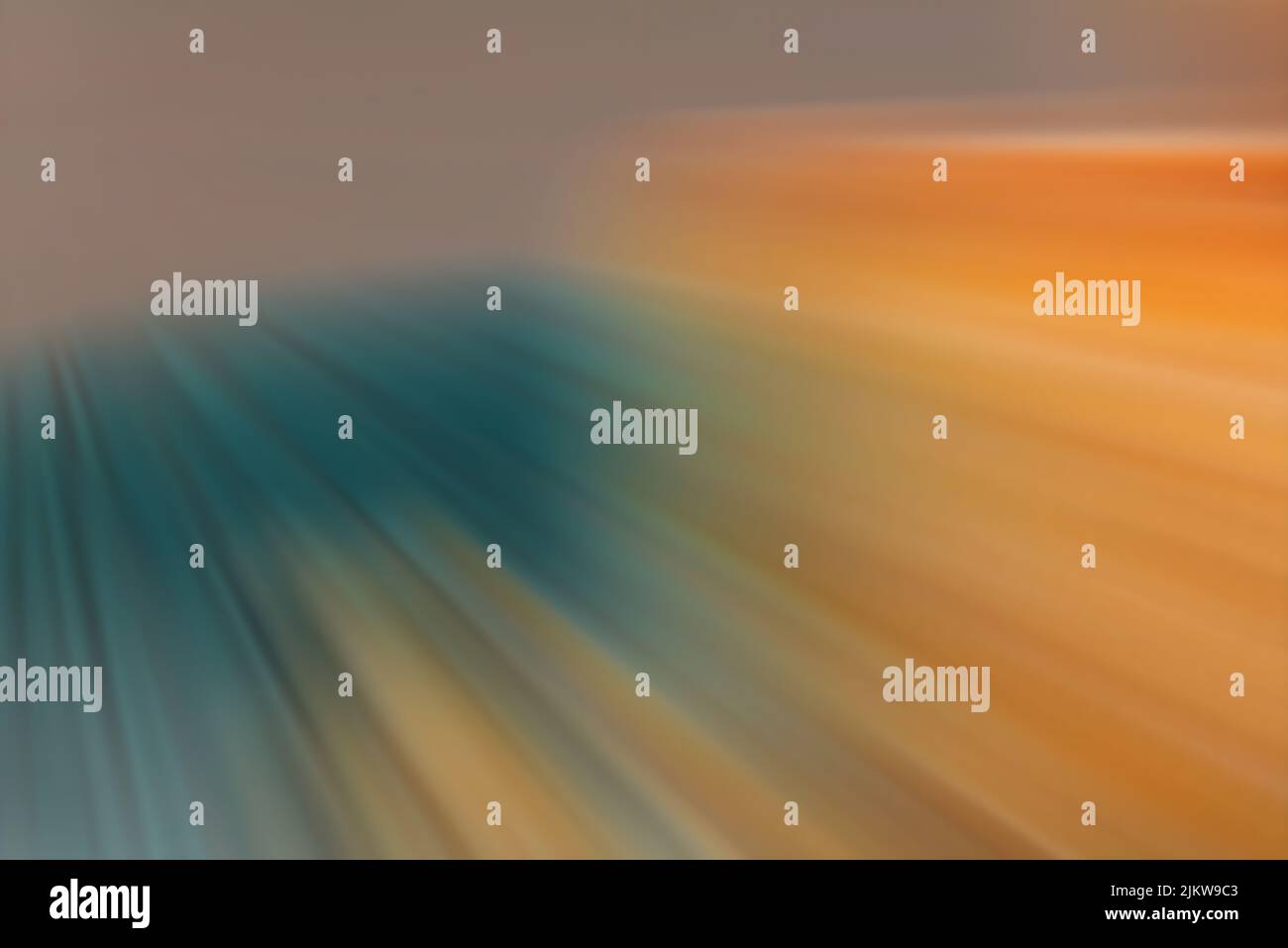A bright colorful starburst with dynamic rays of light Stock Photo