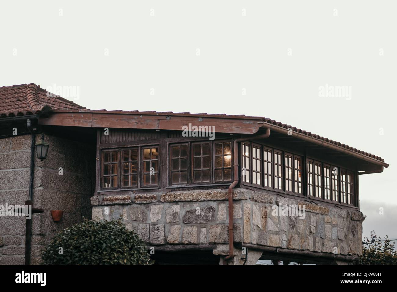 House with cloudy sky hi-res stock photography and images - Alamy