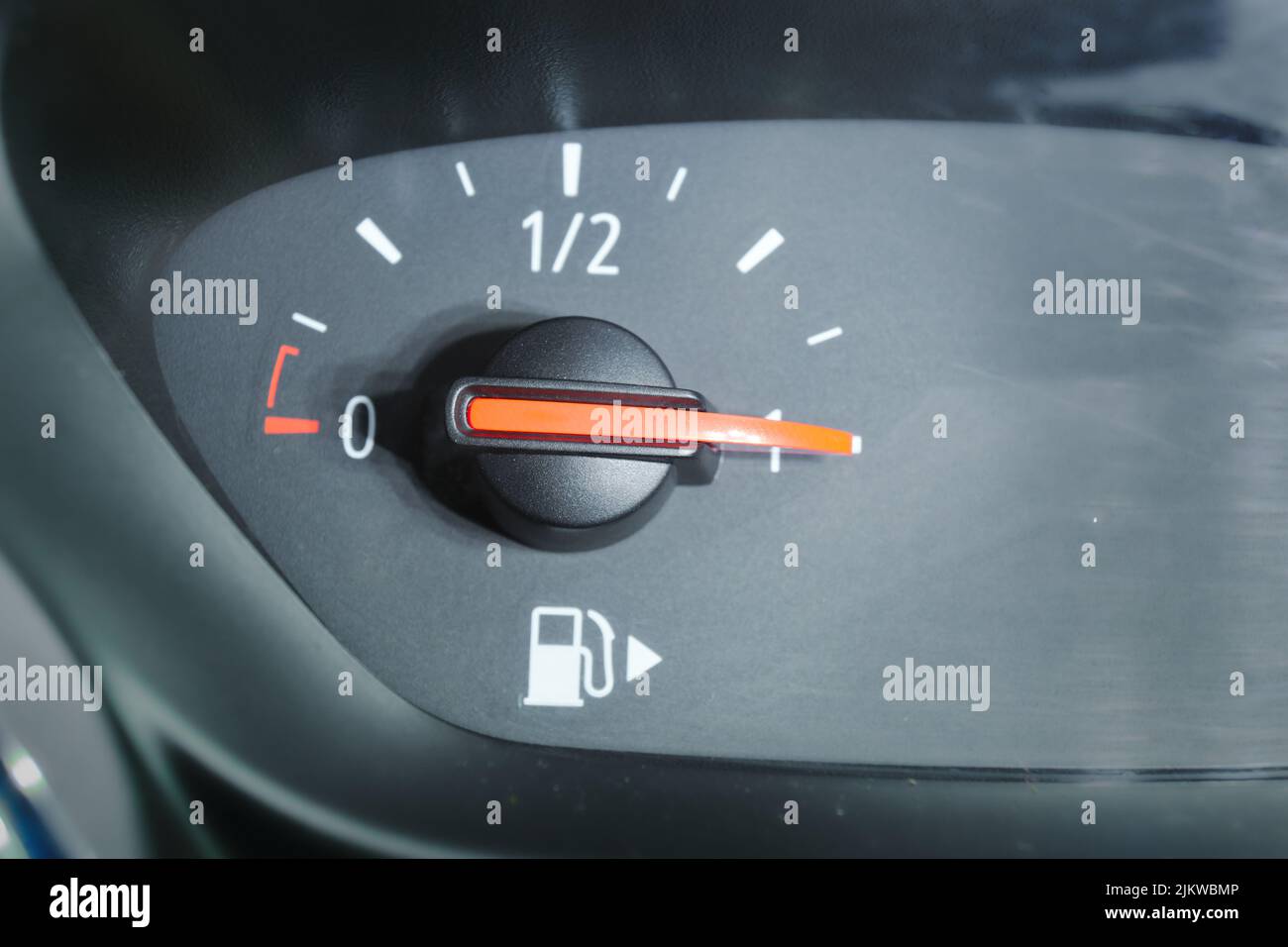 Close up of a fuel gauge showing a full fuel tank in a car