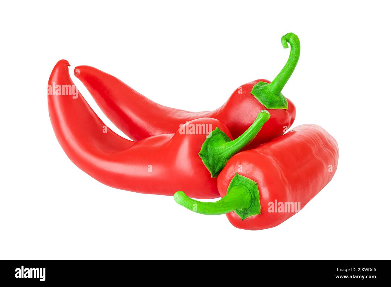 A group of delicious red and hot peppers with shiny skins isolated with clipping path on a white background. Stock Photo