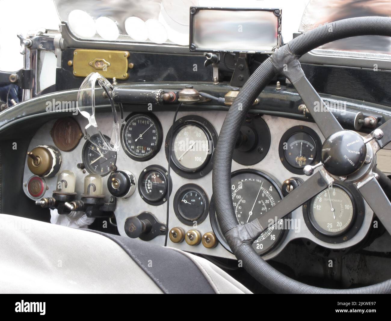 Dashboard and steering wheel in interior of british classic sport car