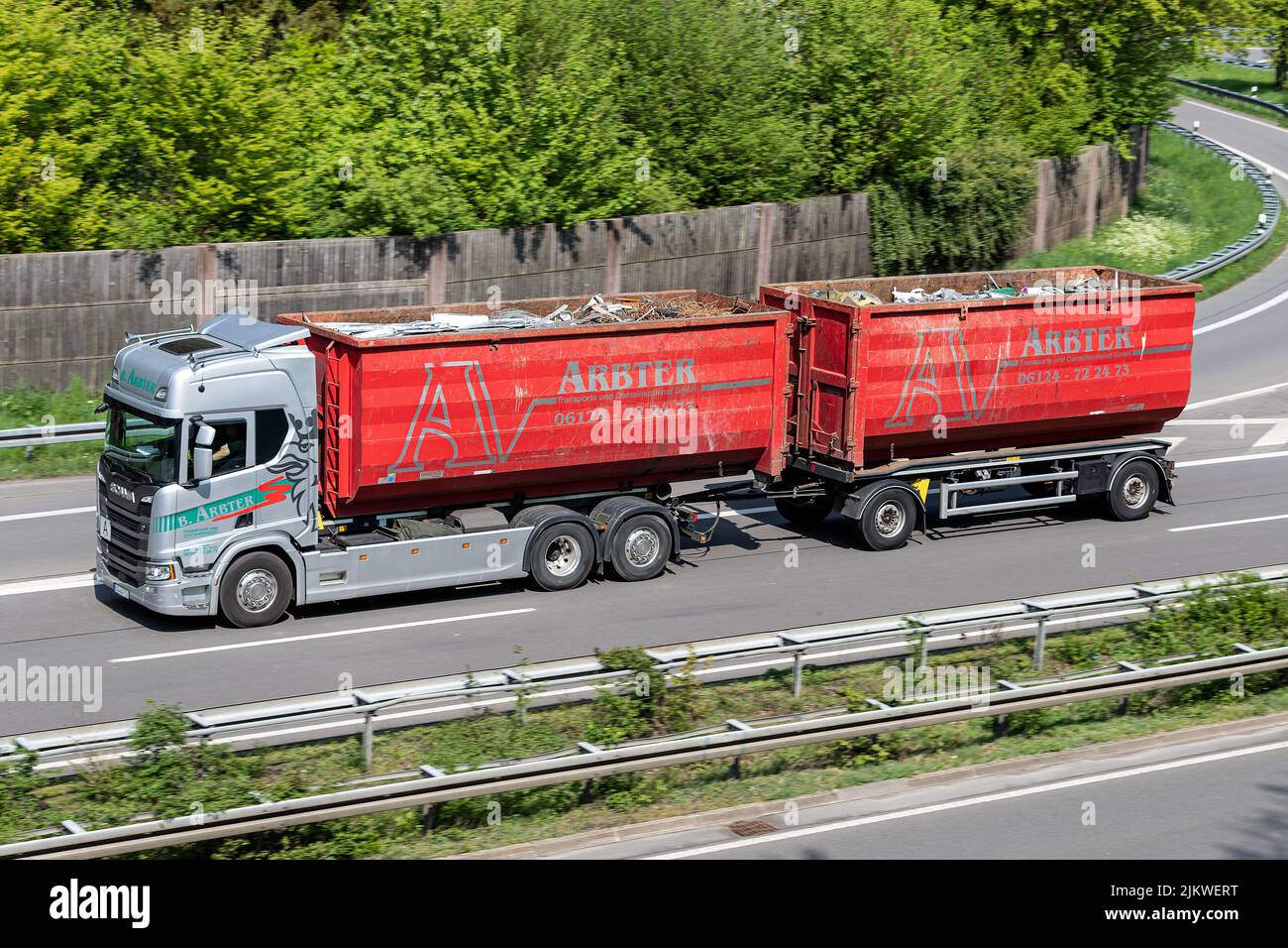 Arbter Scania roll-off conatiner combination truck on motorway Stock Photo