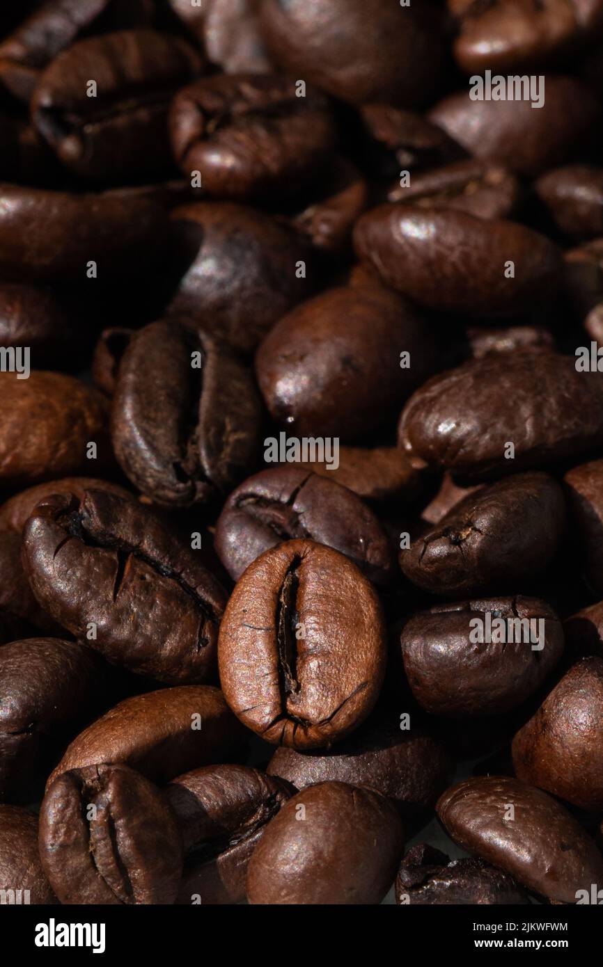 roasted and brown coffee beans background Stock Photo - Alamy