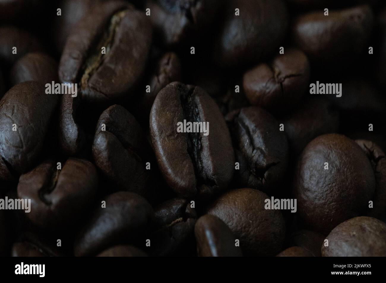 roasted and brown coffee beans background Stock Photo - Alamy