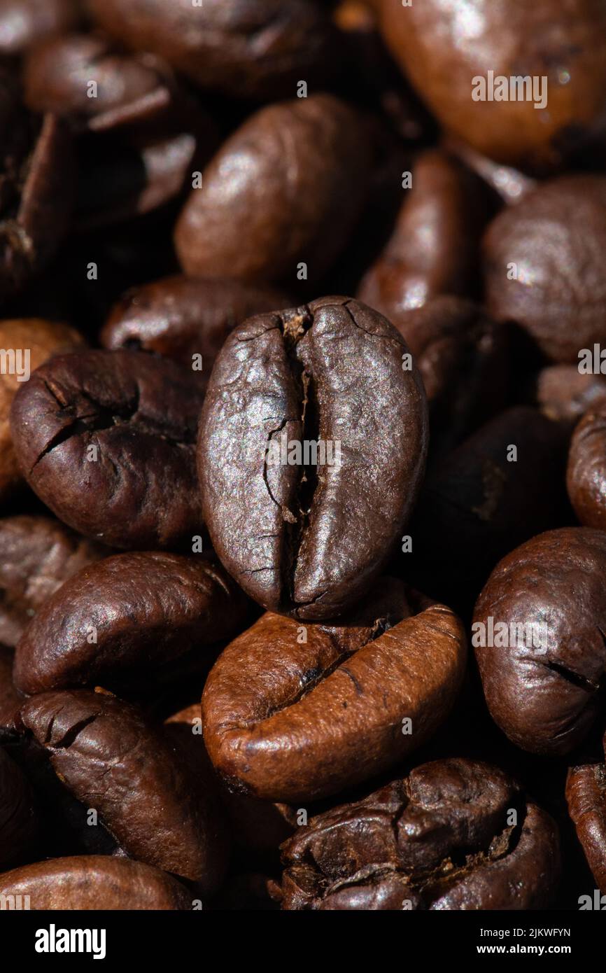 roasted and brown coffee beans background Stock Photo - Alamy