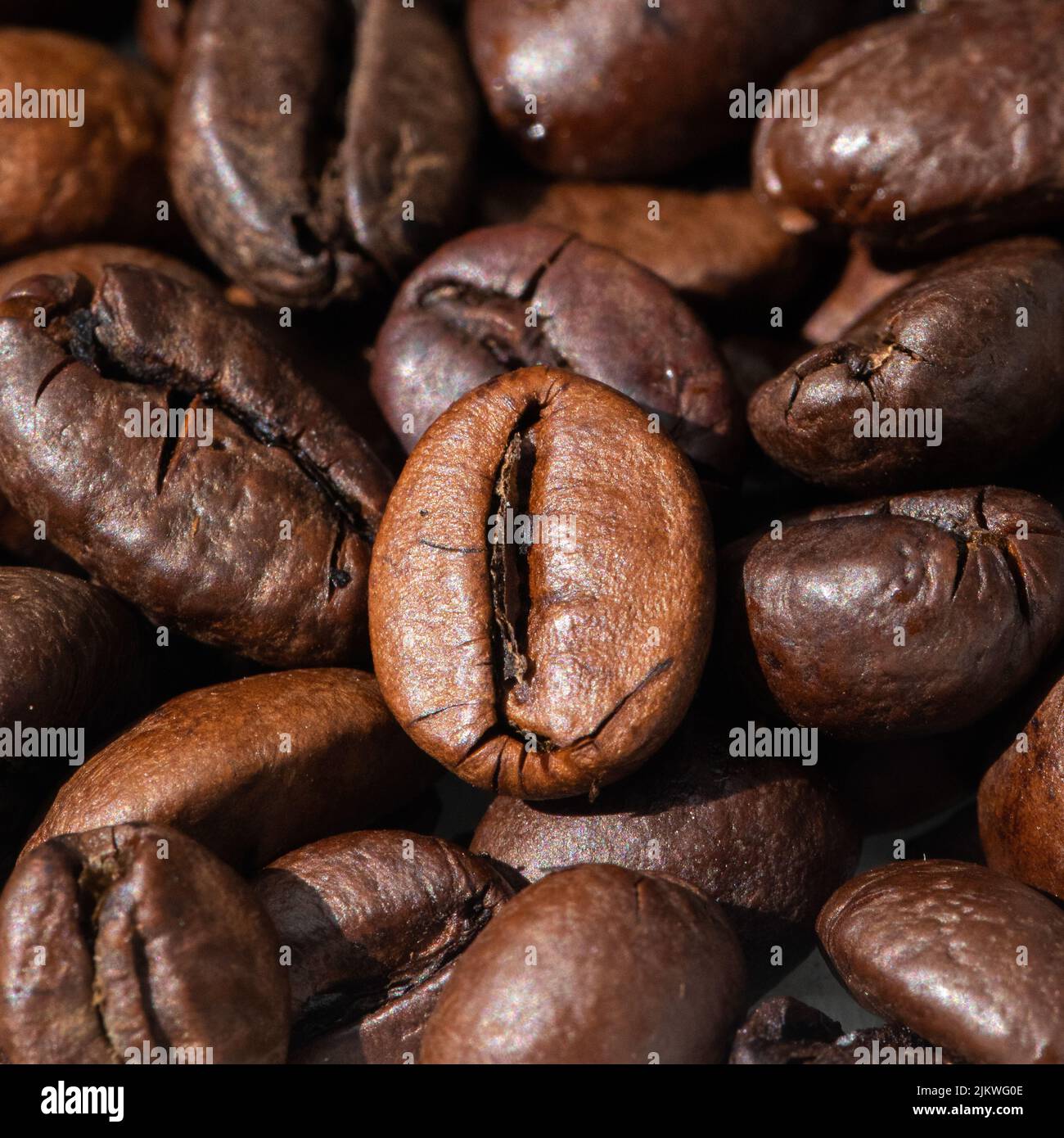 roasted and brown coffee beans background Stock Photo - Alamy