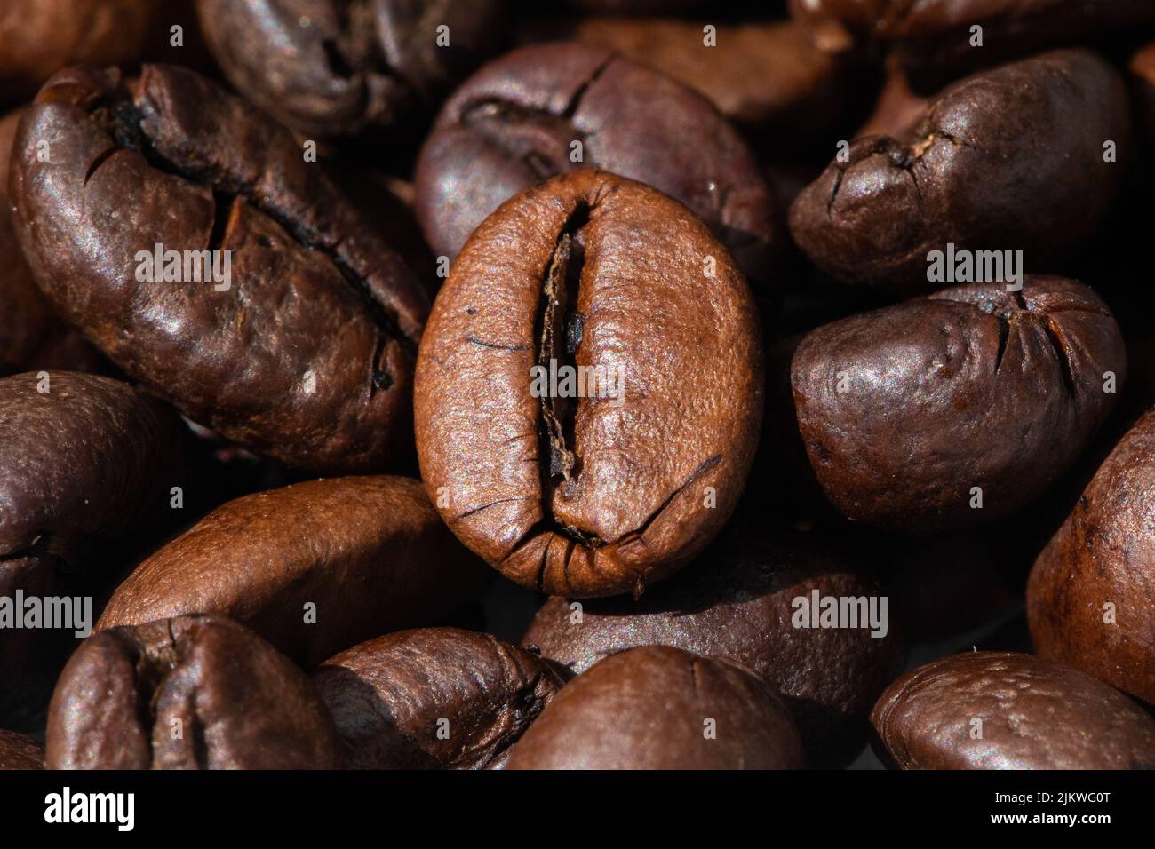 roasted and brown coffee beans background Stock Photo - Alamy