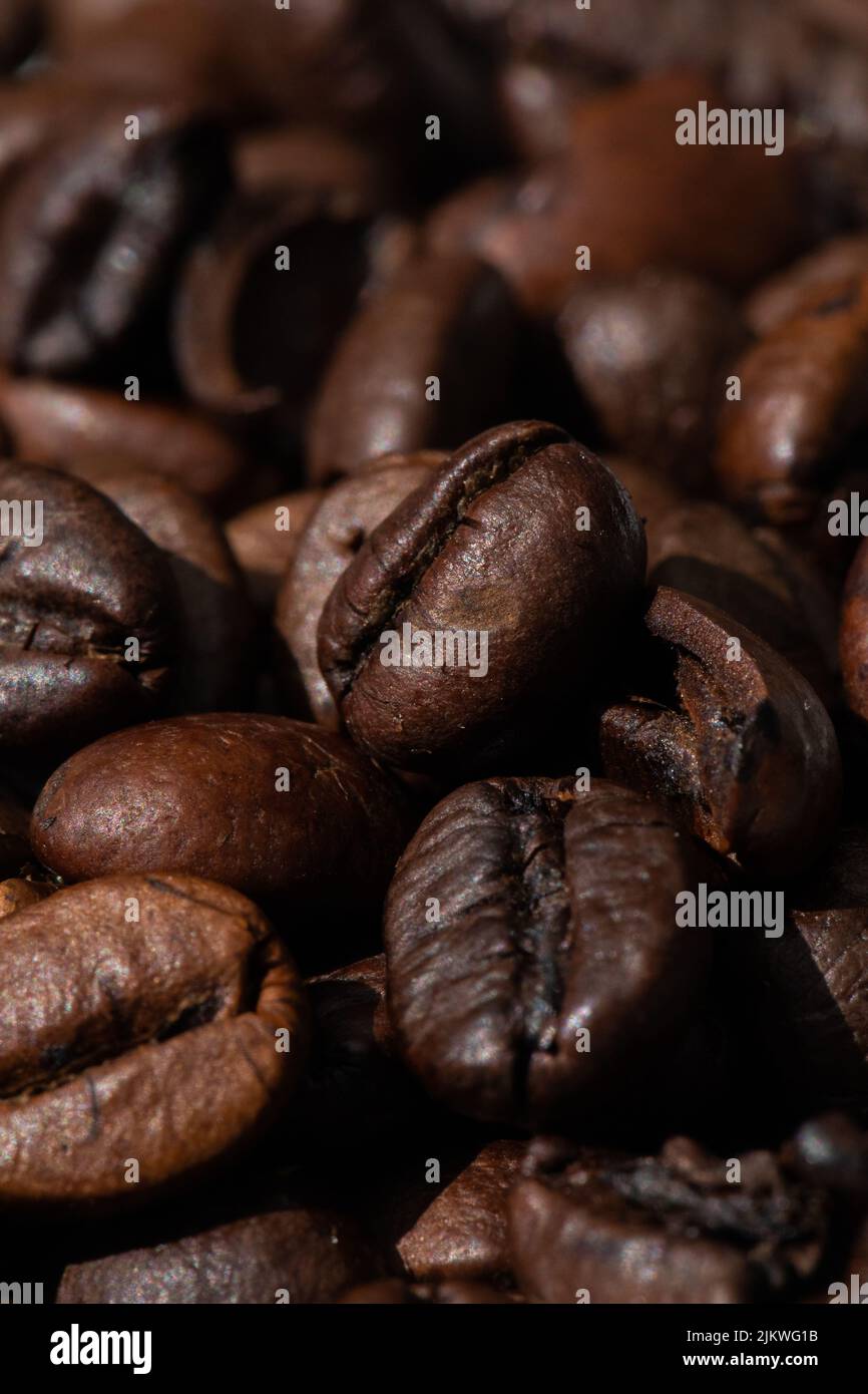 roasted and brown coffee beans background Stock Photo - Alamy