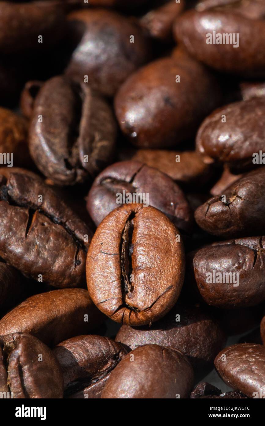 roasted and brown coffee beans background Stock Photo - Alamy