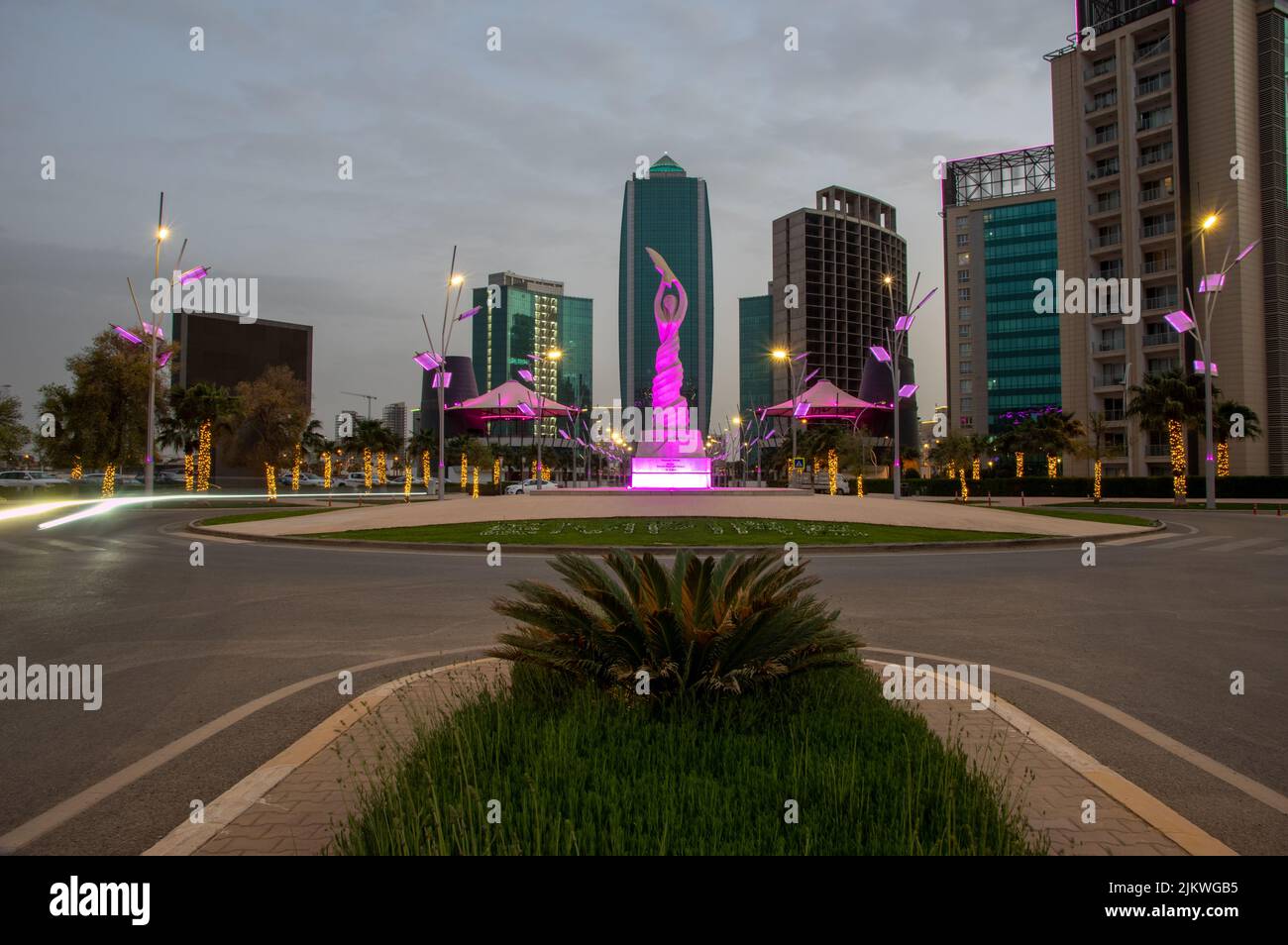 A modern Empire City in Erbil, Iraq, the Capital city of Kurdistan region with evening lights Stock Photo