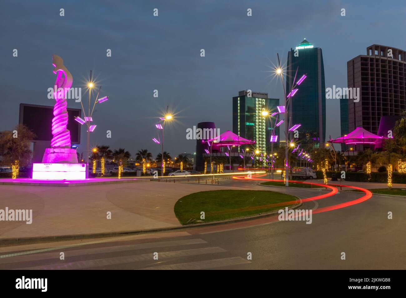 The modern empire city in Erbil, Iraq, the capital city of the Kurdistan region with evening lights Stock Photo