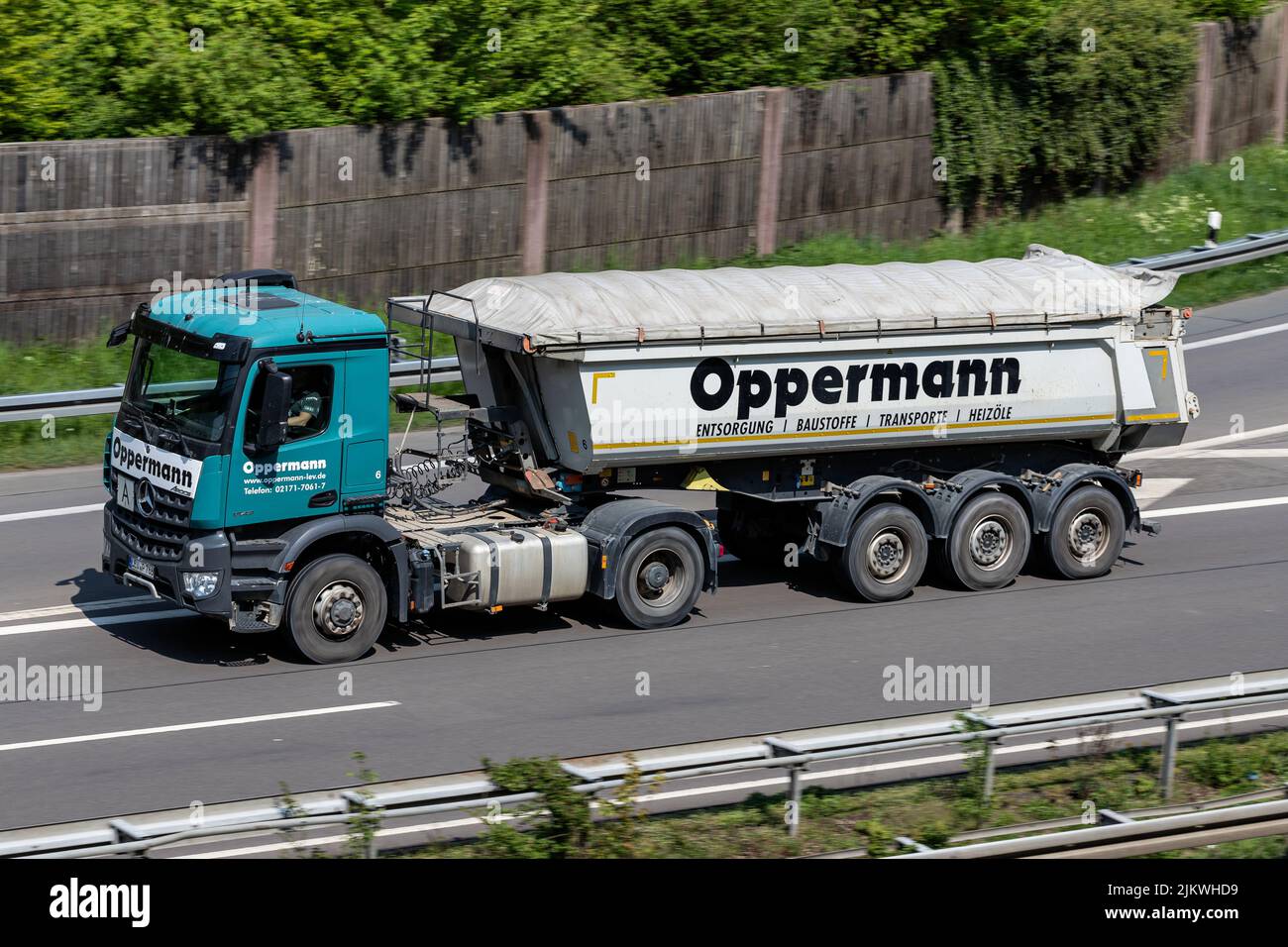 Oppermann Mercedes-Benz Arocs truck with tipper trailer on motorway Stock Photo