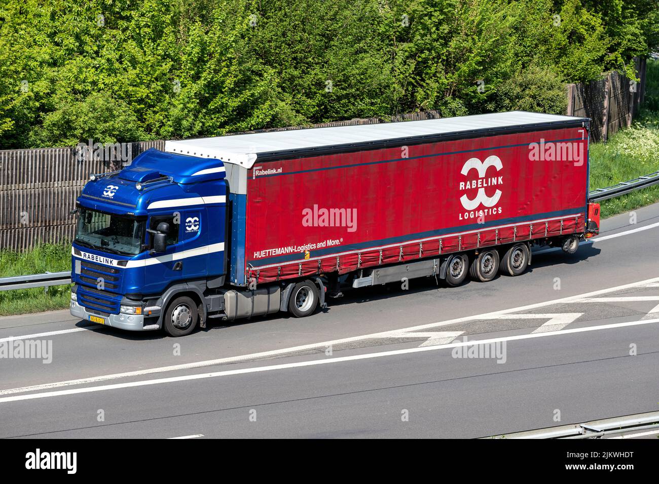 Rabelink Scania truck with curtainside trailer on motorway Stock Photo