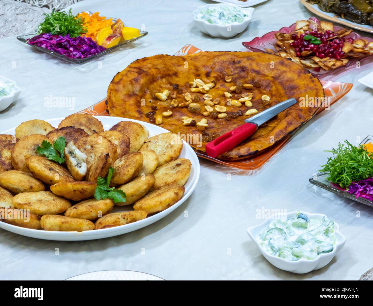 A closeup of the traditional Kurdish dinner table with different dishes