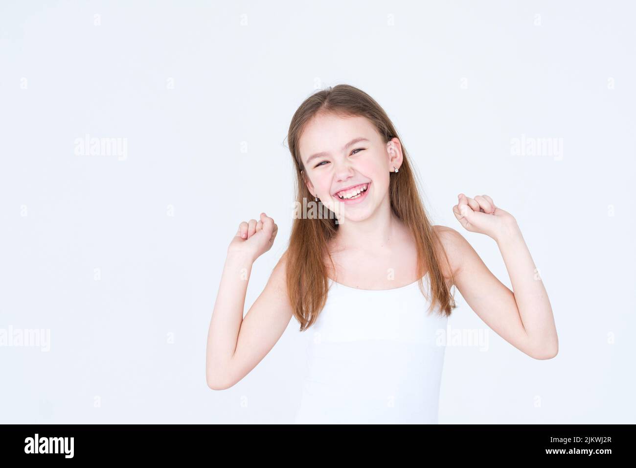 emotion joyful delighted smiling child girl Stock Photo