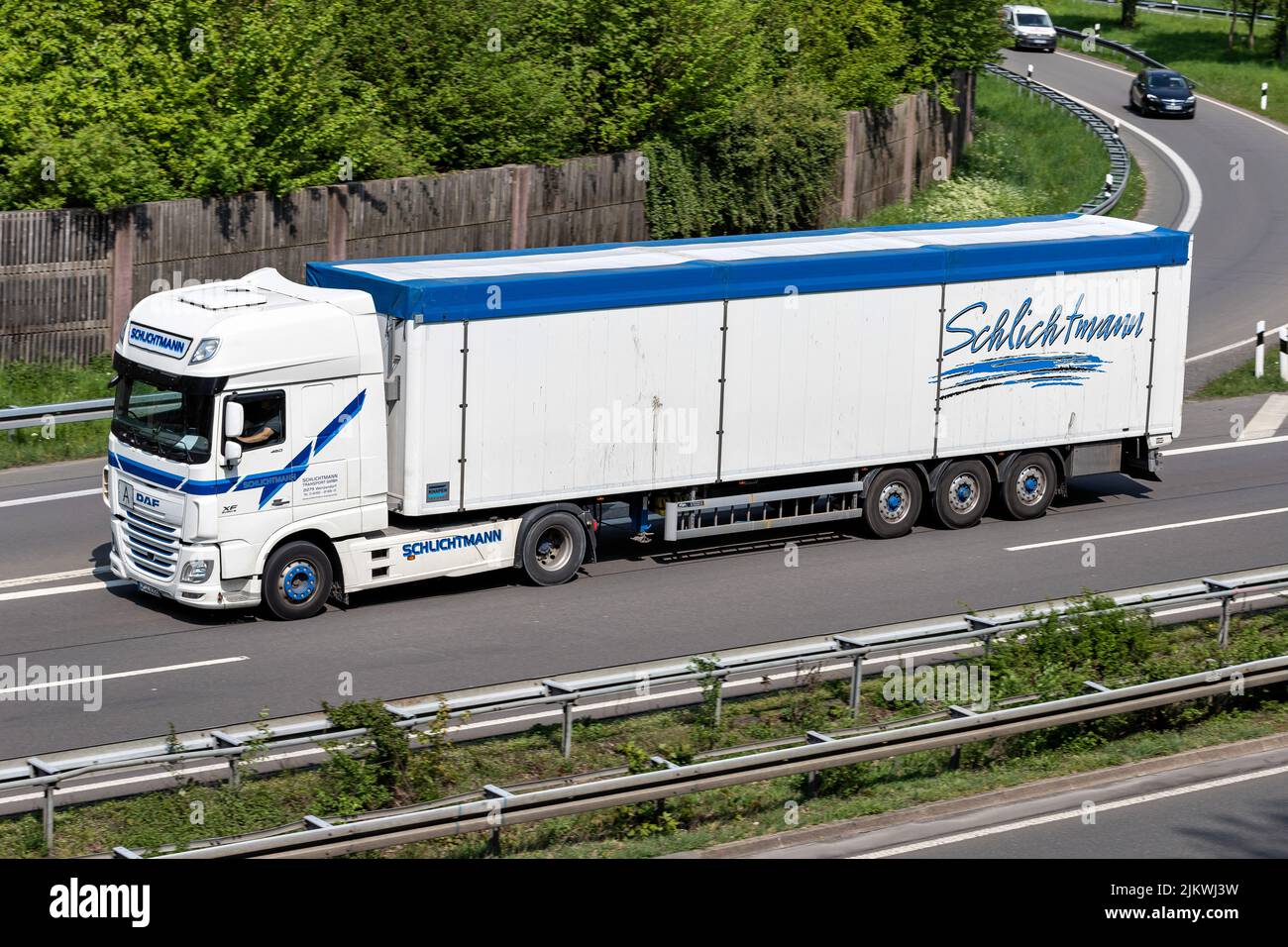 Schlichtmann DAF XF truck with bulk trailer on motorway Stock Photo