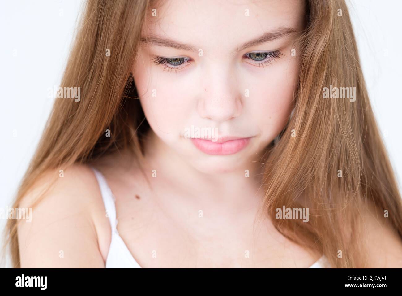 emotion sad hurt offended pursed lips child girl Stock Photo Alamy