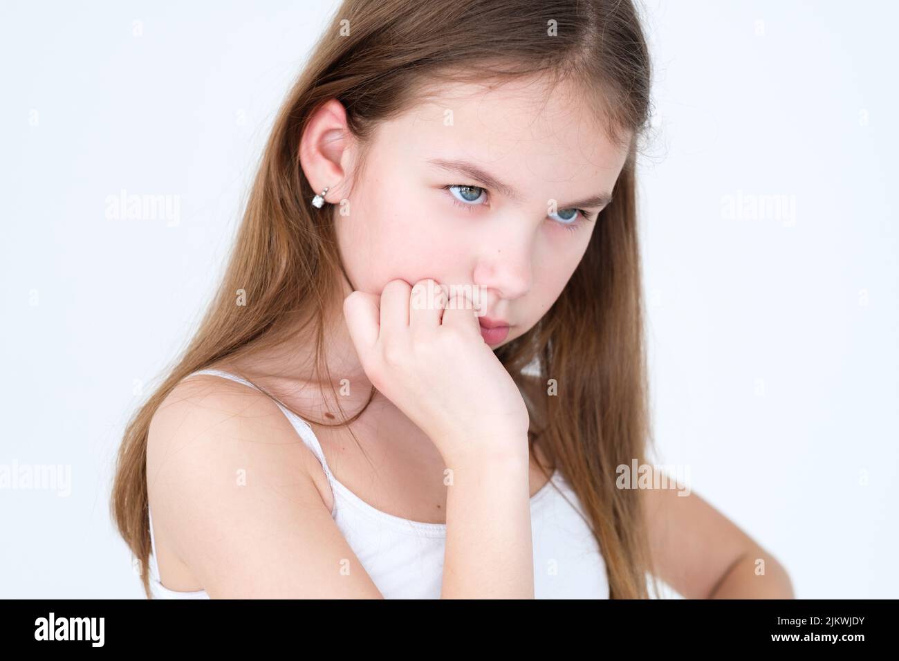 emotion thoughtful face expression girl pensive Stock Photo