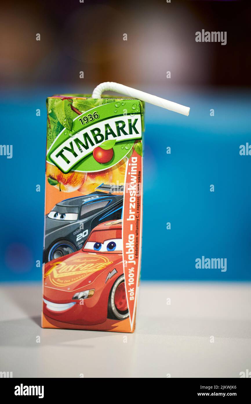 A Polish Tymbark brand apple juice in a box with Lightning McQueen
