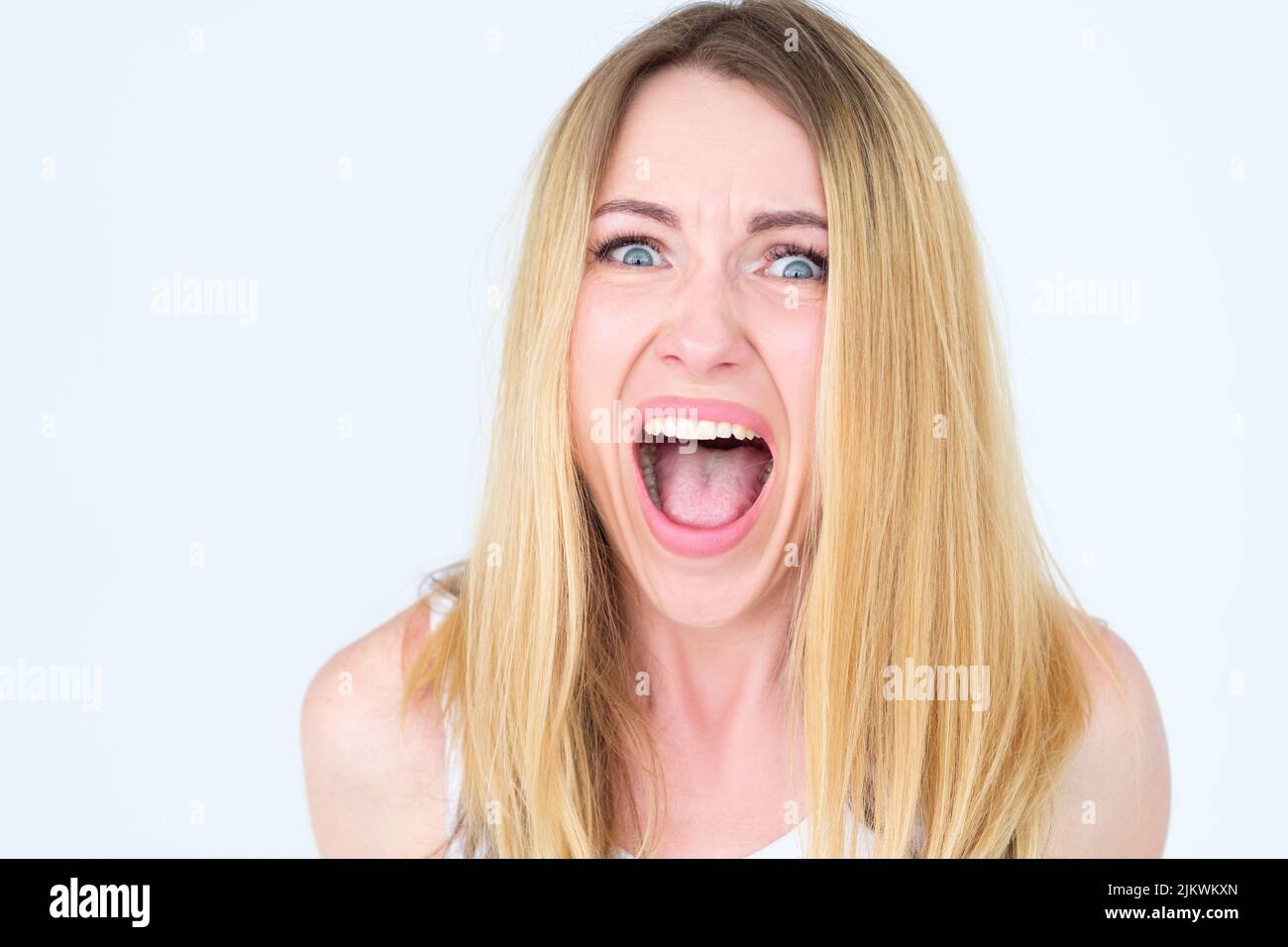 emotion face scared terrified fearful girl scream Stock Photo