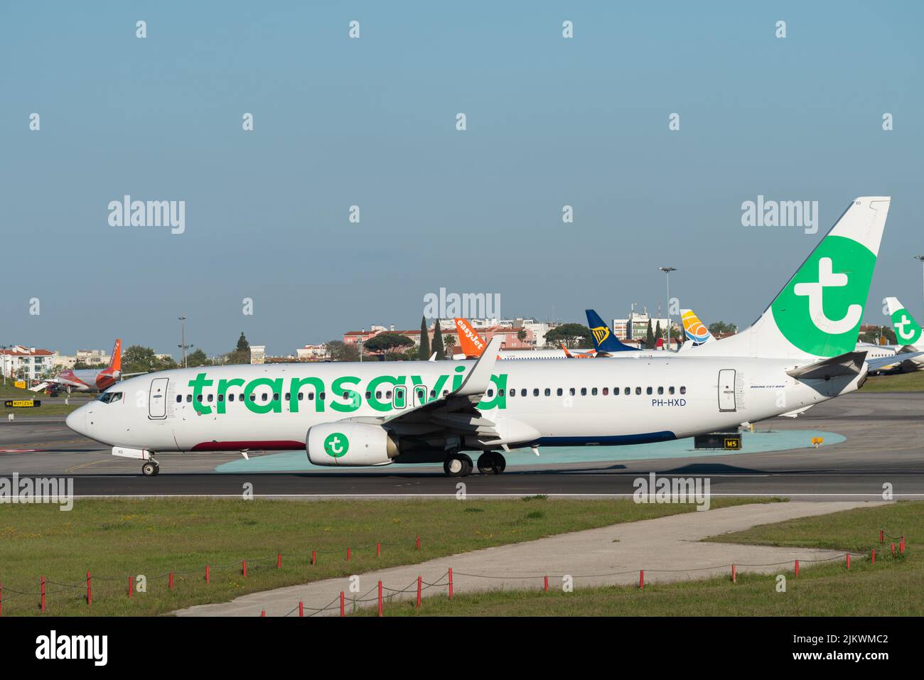 The Transavia airline Boeing 737-8K2 plane starting takeoff at Lisbon airport Stock Photo