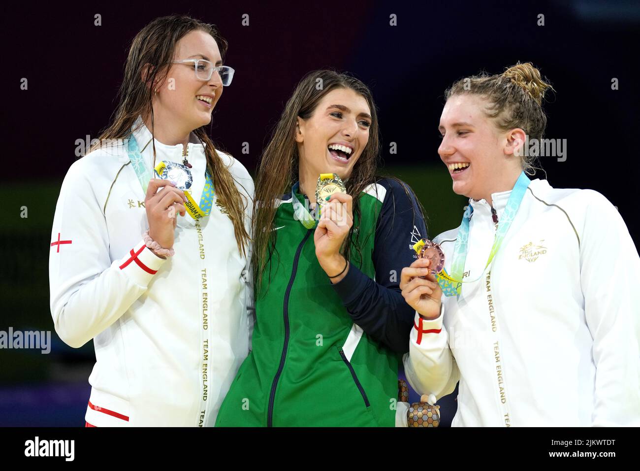 Northern Ireland's Bethany Firth (centre) with the gold medal, England's Jessica-Jane Applegate (left) with the silver medal and England's Louise Fiddes with the bronze after the Women's 200m Freestyle S14 Final at the Sandwell Aquatics Centre on day six of the 2022 Commonwealth Games in Birmingham. Picture date: Wednesday August 3, 2022. Stock Photo