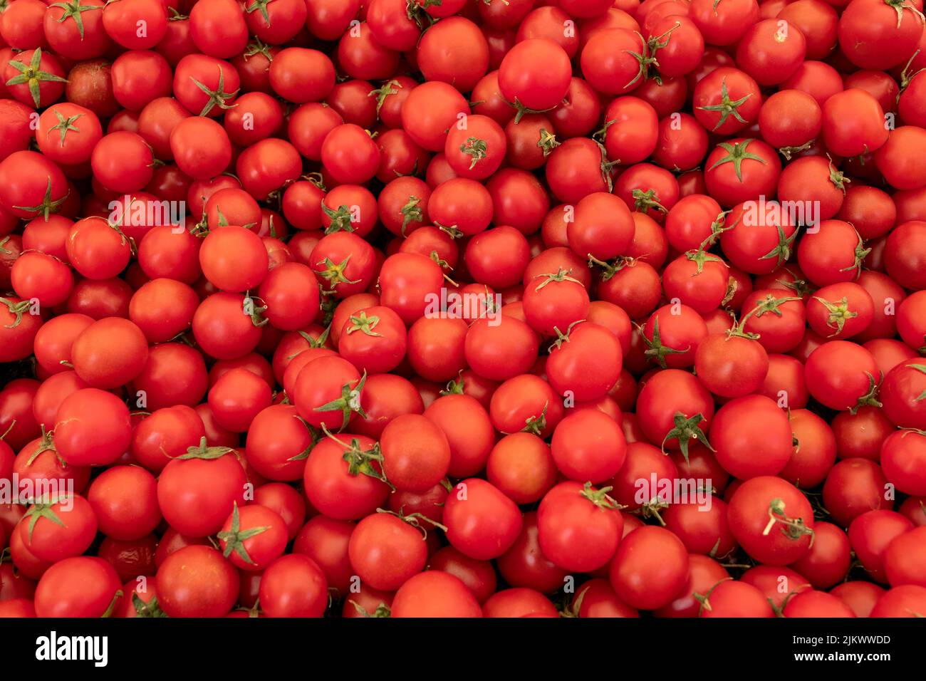 background with fresh red tomatoes in market Stock Photo