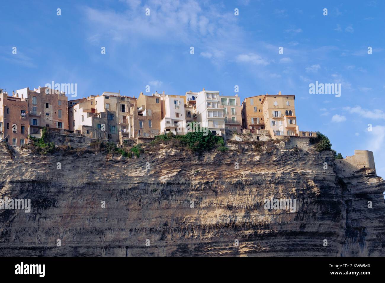 The blue sky over the coastal town on a seacliff on a sunny day in summer Stock Photo
