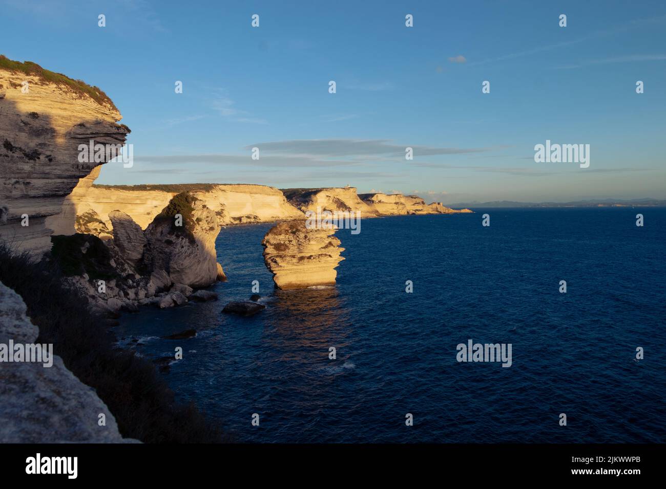 The blue sky over the sea and Bonifacio captured at early sunset in summer Stock Photo