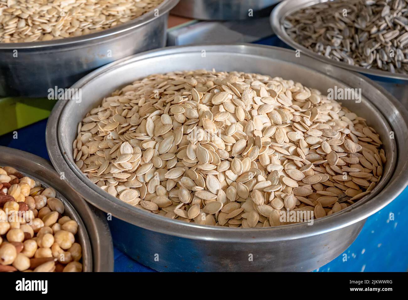 Melon and pumpkin seeds for sale at farmers market Stock Photo