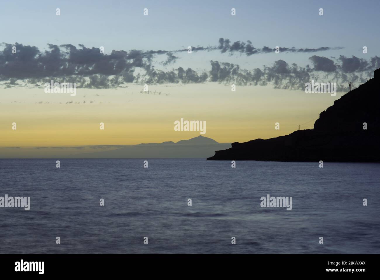 A mesmerizing view of sunset over the sea in Gran Canaria, Spain Stock Photo