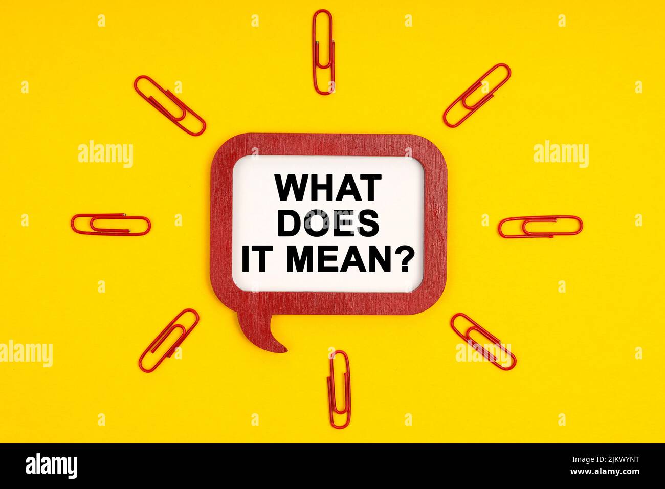 Business and education concept. On a yellow background, paper clips and