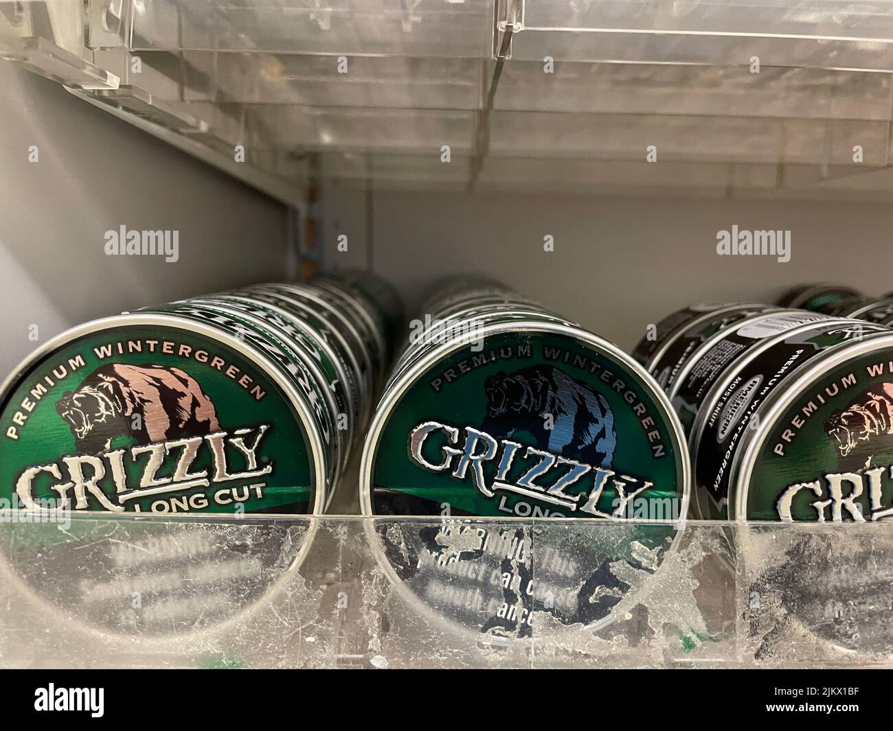 Grovetown, Ga USA - 03 20 22: Smokeless tobacco products on a retail store  shelf Grizzly Stock Photo