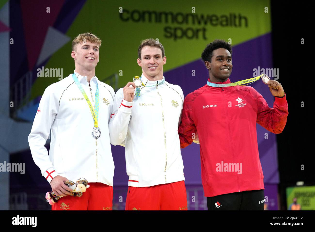 England's Benjamin Proud (centre) with the gold medal, England's Lewis Edward Burras (left) with the silver medal and Canada's Joshua Liendo Edwards with the bronze medal after the Men's 50m Freestyle Final at the Sandwell Aquatics Centre on day six of the 2022 Commonwealth Games in Birmingham. Picture date: Wednesday August 3, 2022. Stock Photo