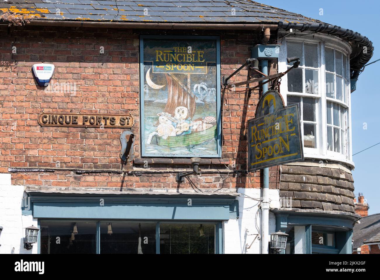 Cinque Ports street sign and The Runcible Spoon shop, Rye, East Sussex
