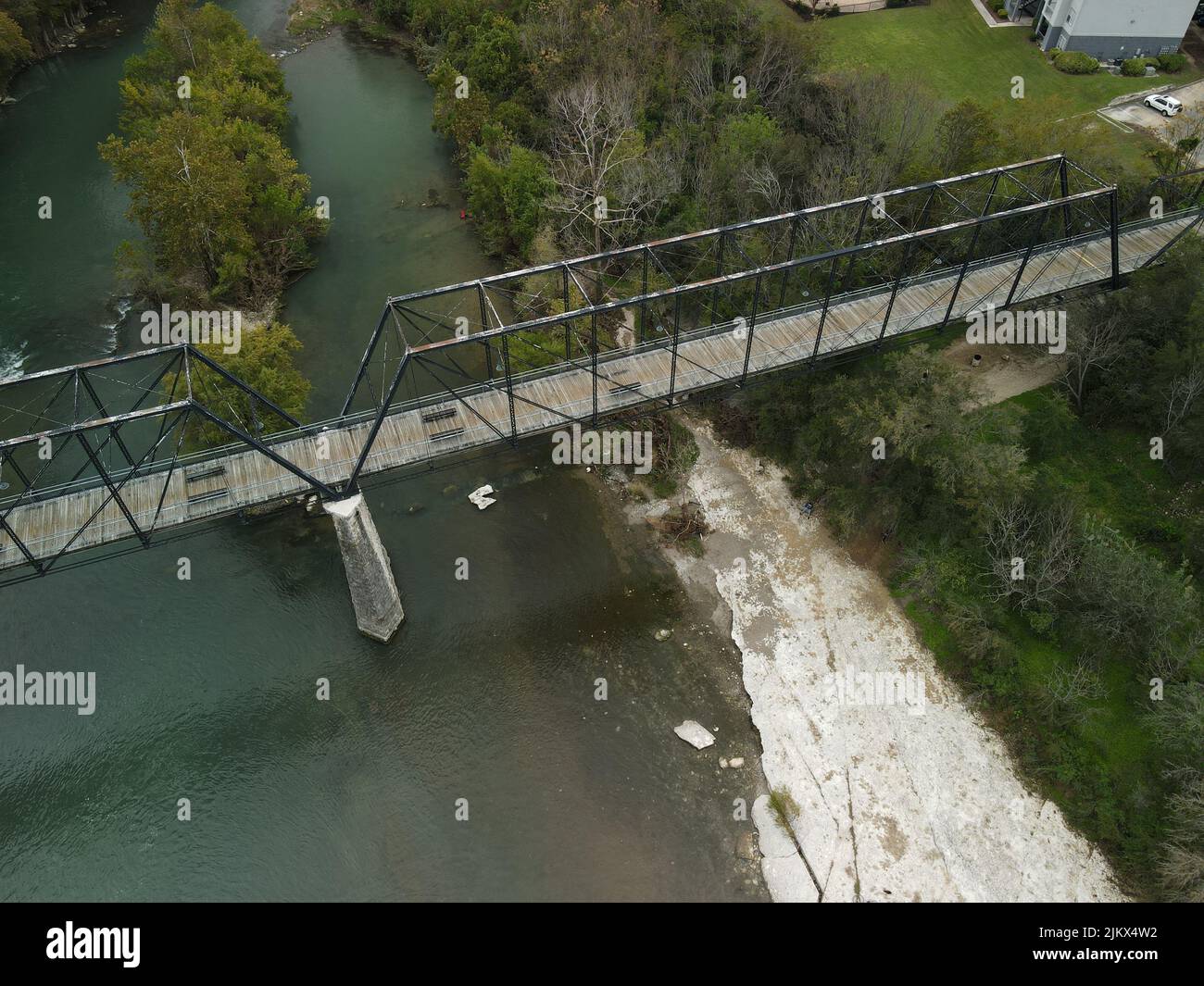 An aerial view of New Braunfels, Tx. Faust St. bridge, and Guadalupe