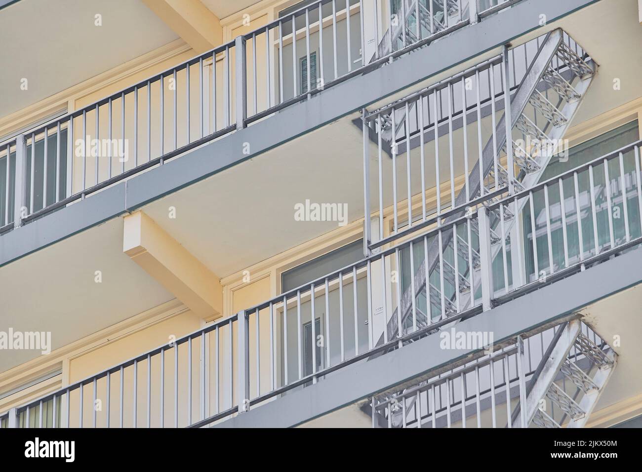 A low angle shot of building balconies and emergency stairs - great for backgrounds Stock Photo
