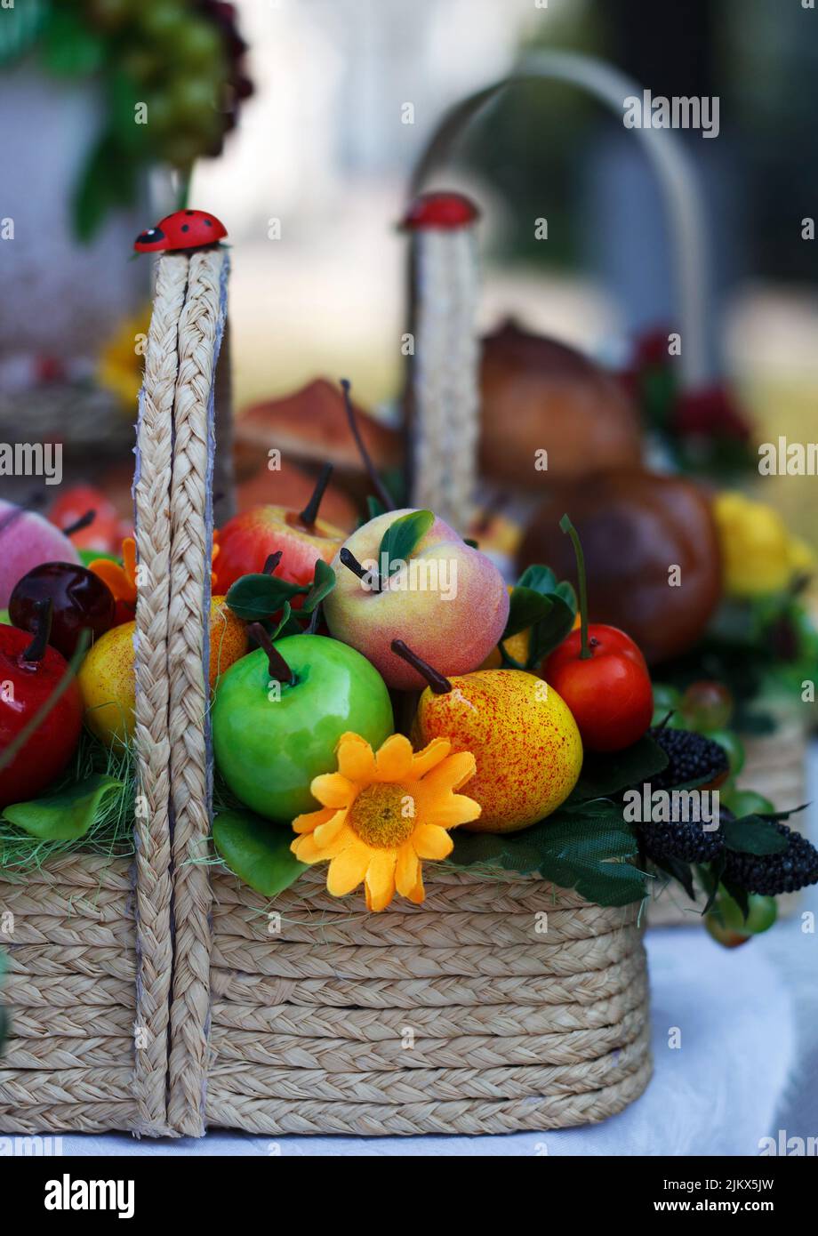 Basket with artificial different fruits, bright color, beautiful