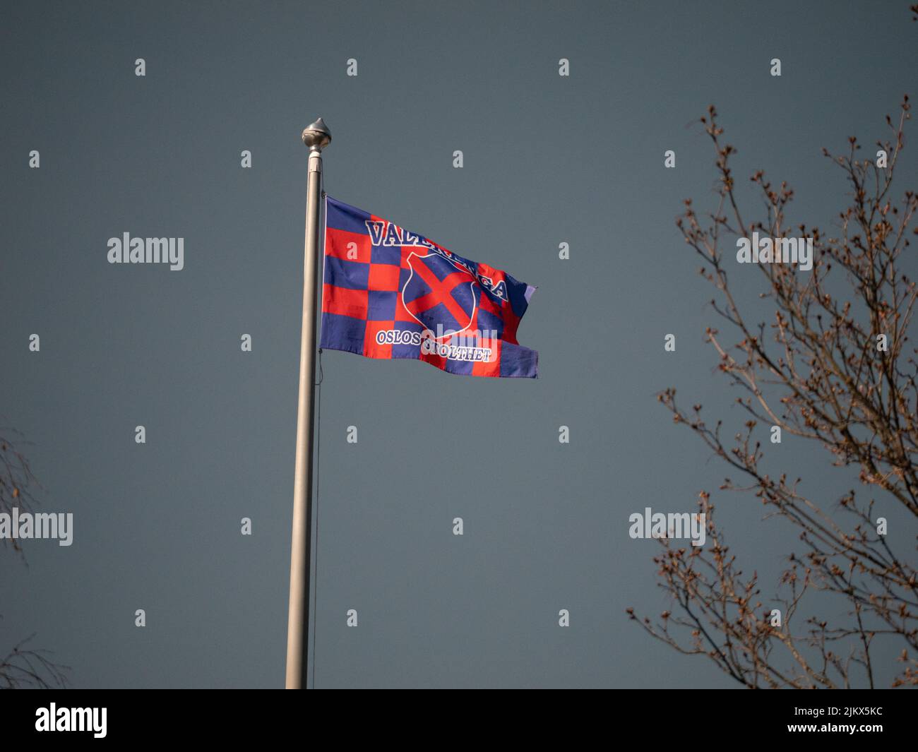 A flag with a coat of arms for the Valerenga football and ice hockey team in Oslo, Norway Stock