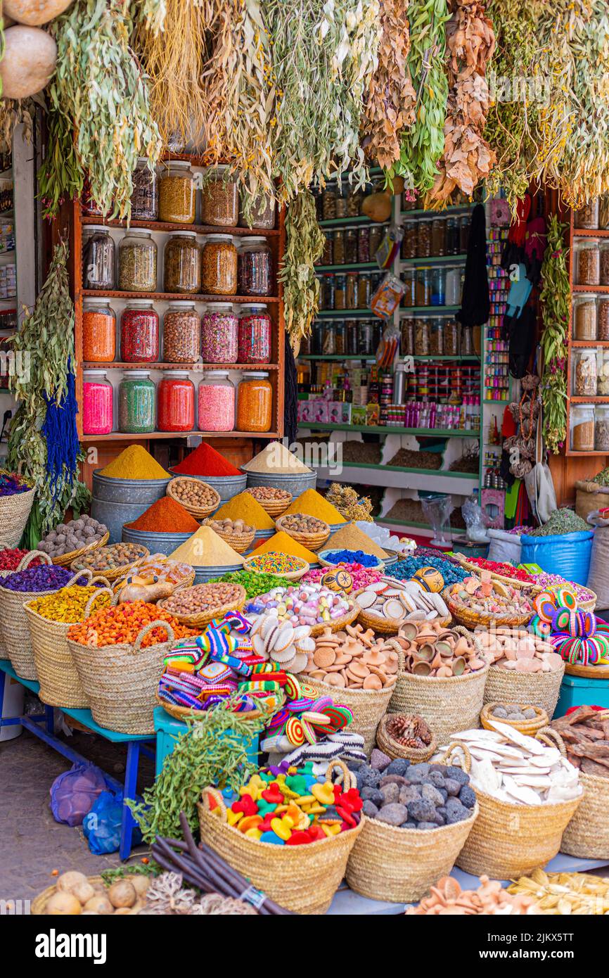 Different spices in different shapes and recipients all together in a spices market shop in Marrakesh, Morocco Stock Photo