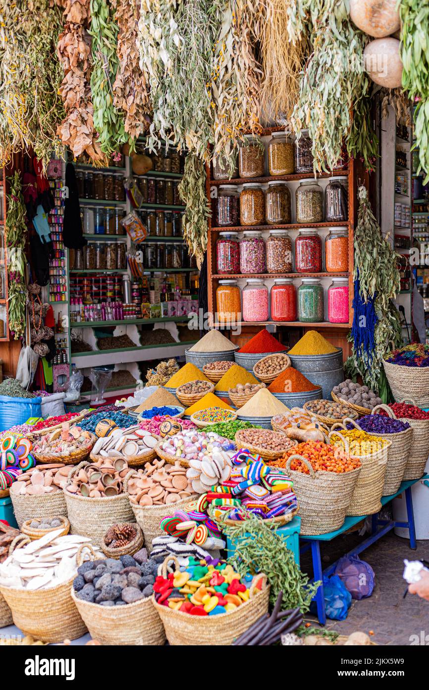 Different spices in different shapes and recipients all together in a spices market shop in Marrakesh, Morocco Stock Photo