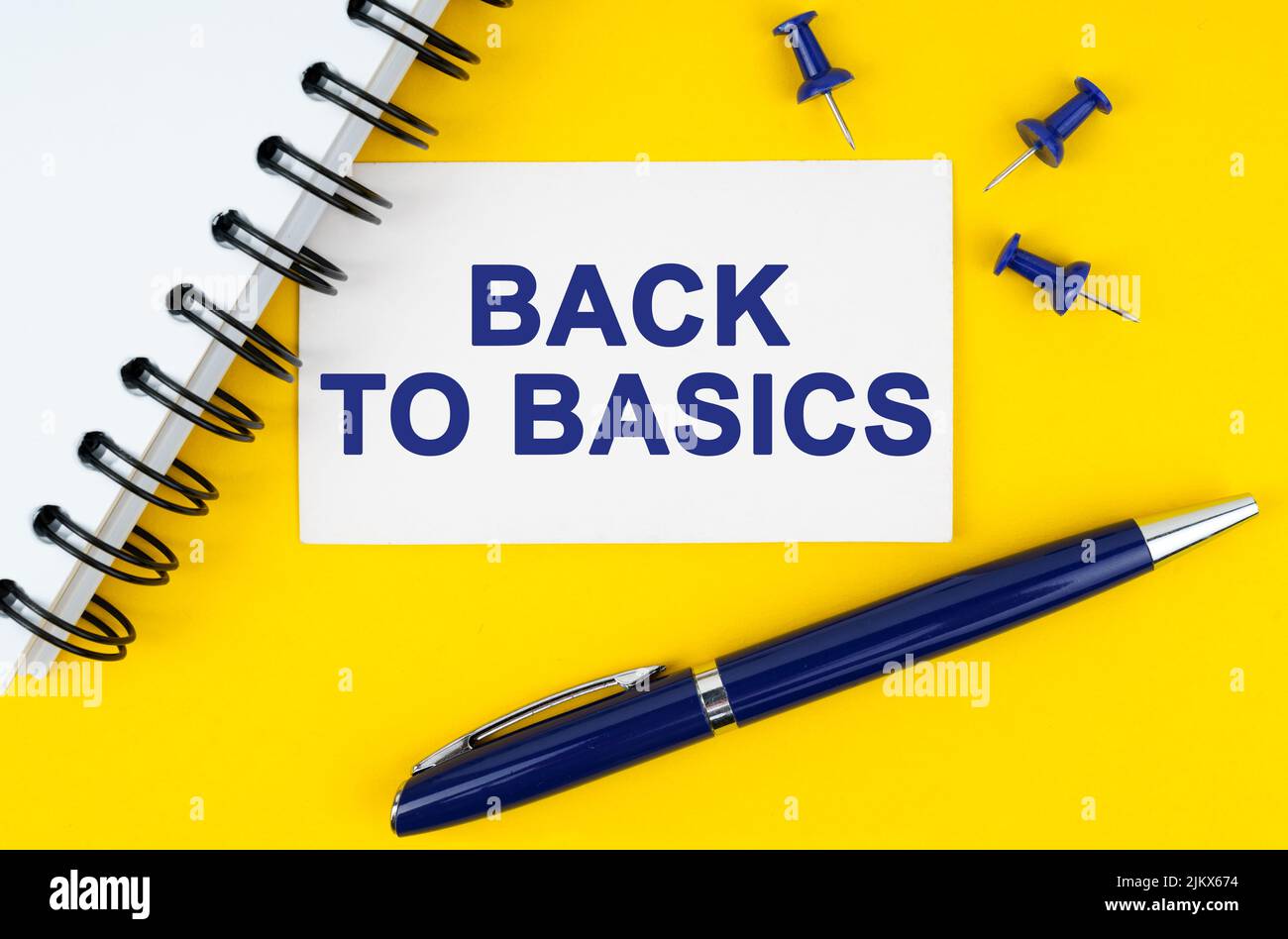 Business and finance concept. On a yellow background lies a notebook, a ...
