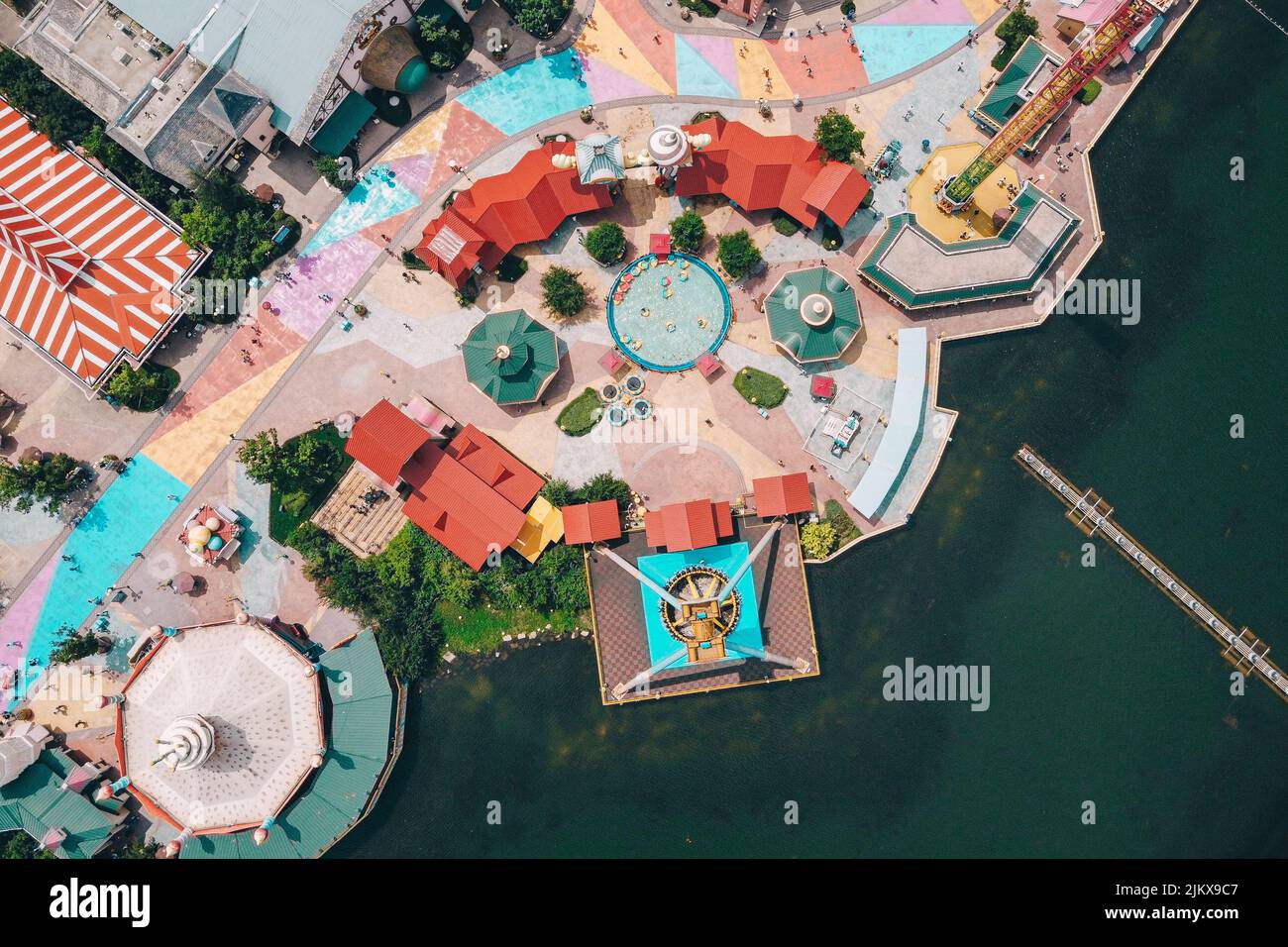 A bird's eye view of a colorful park by the water Stock Photo